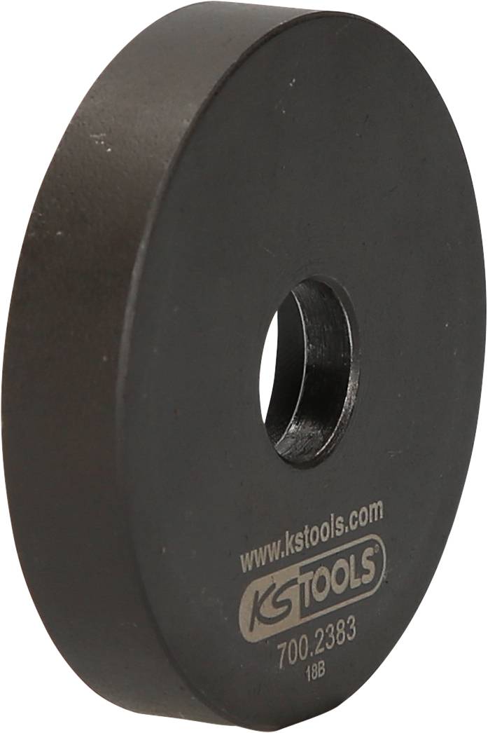 Schwarze Metallscheibe mit Loch in der Mitte, Aufschrift sichtbar: "www.kstools.com" und "700.2383".