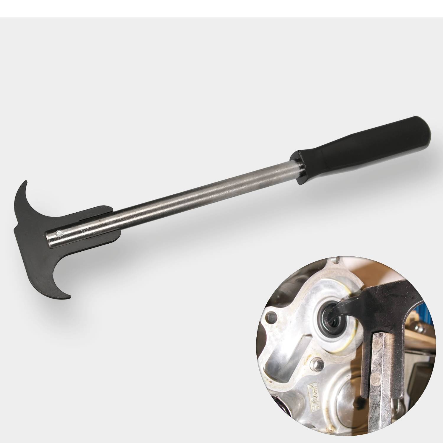 Ein mechanisches Brecheisen-Werkzeug und eine Nahaufnahme seiner Verwendung, um ein Bauteil zu lösen.