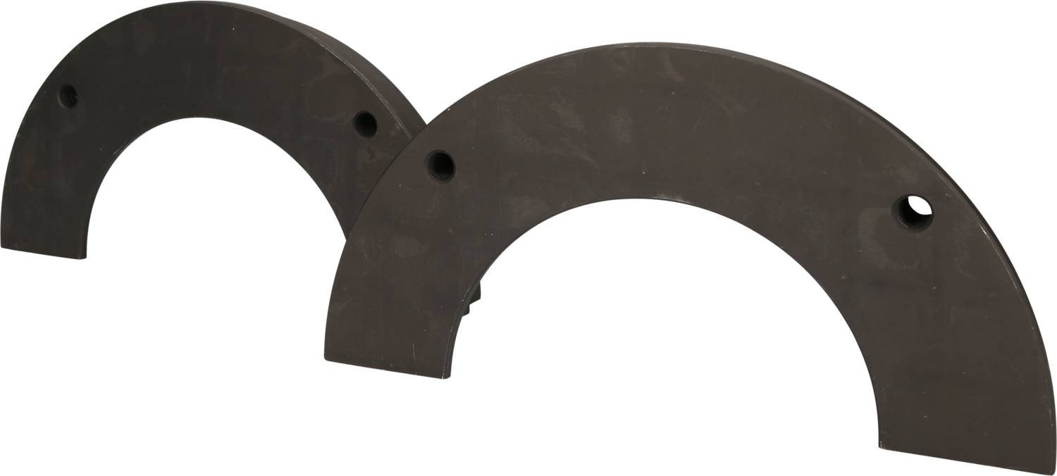Zwei schwarze Halbkreise aus festem Material liegen nebeneinander. Sie sind glatt, mit kleinen Löchern versehen und könnten technische Bauteile sein.