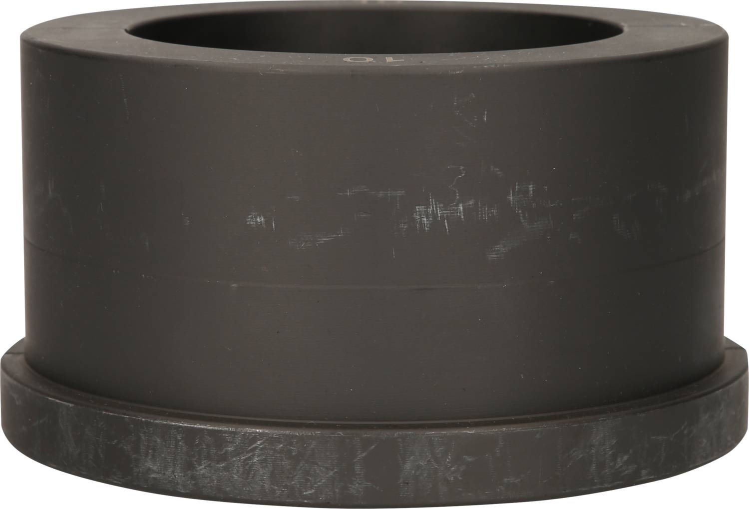 Ein zylindrisches, schwarzes Objekt mit breitem Sockel.