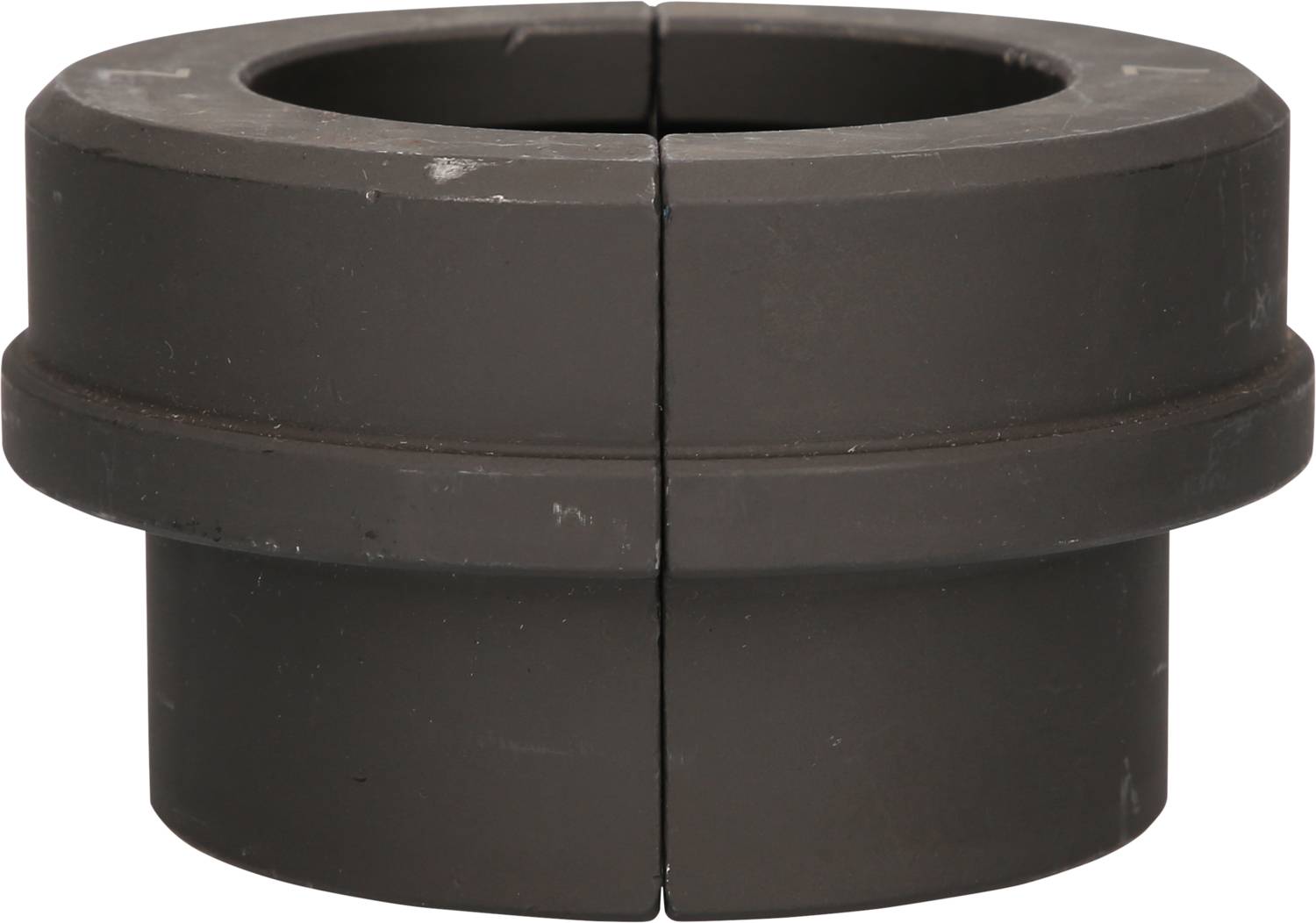 Ein schwarzes, zylindrisches Maschinenteil in zwei Hälften geteilt, nebeneinanderstehend, mit glatten Oberflächen und zentraler Öffnung.