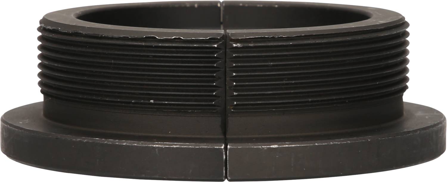 Schwarzes, zylindrisches Metallteil mit Rillen an der Außenseite. Es hat eine flache Basis und scheint aus robustem Material zu bestehen.
