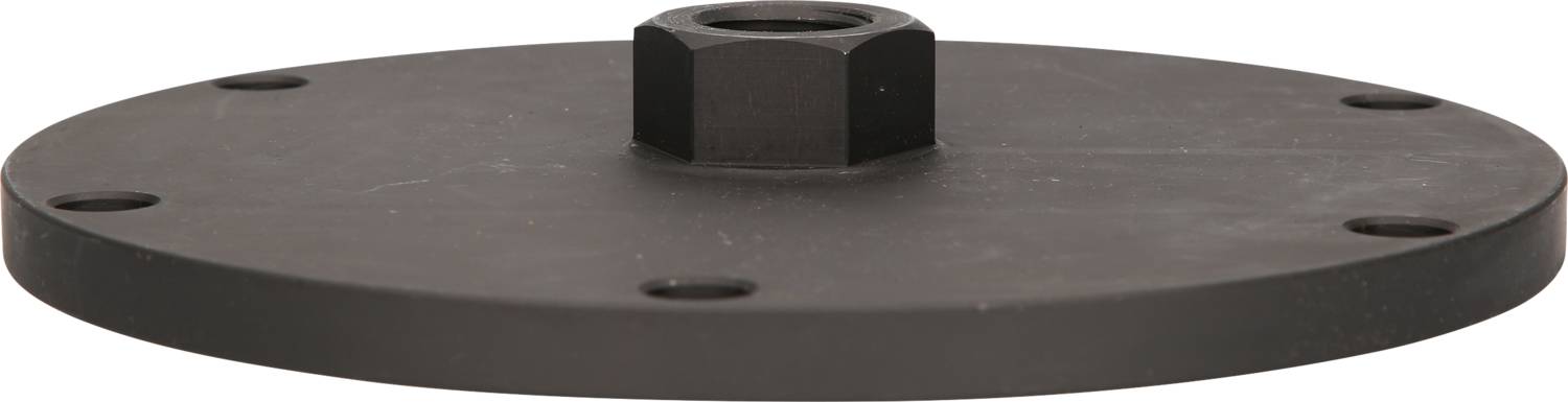 Runde, schwarze Metallplatte mit zentraler sechseckiger Erhebung und umliegenden Schraublöchern, möglicherweise als Montagebasis verwendet.