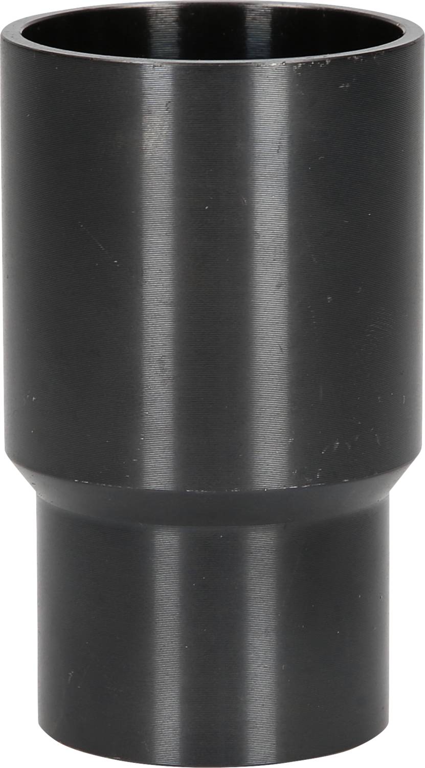 Ein zylindrisches, schwarzes Metallstück mit breiterer Oberseite und schmalerer Unterseite.