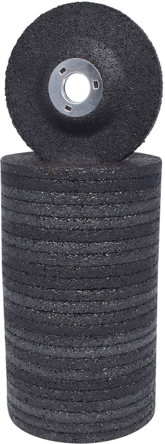 Ein Stapel schwarzer Schleifscheiben und eine einzelne Scheibe daneben.
