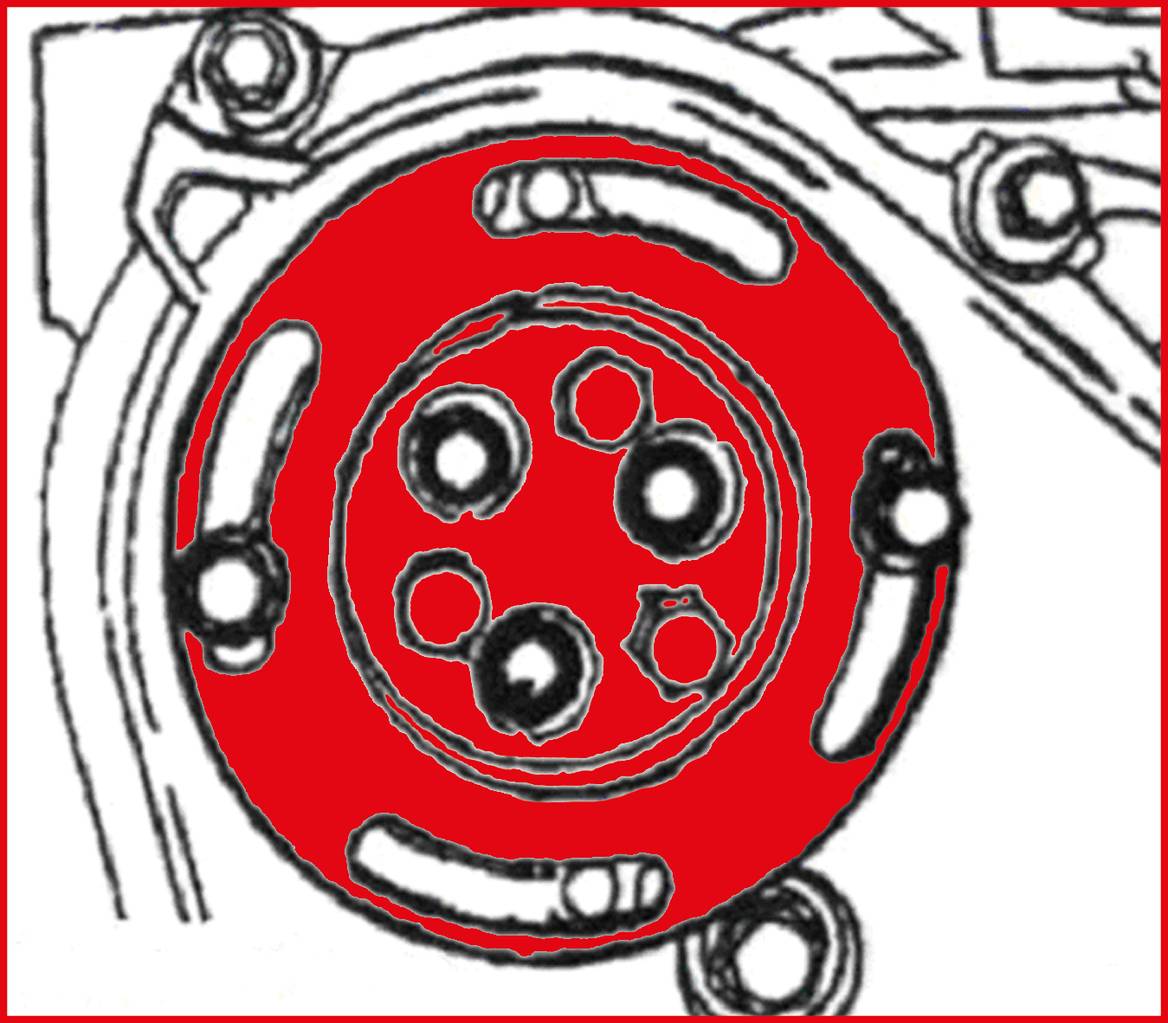 Eine technische Zeichnung eines runden Maschinenteils mit roten Akzenten und mehreren Löchern, wahrscheinlich Teil eines Motors.