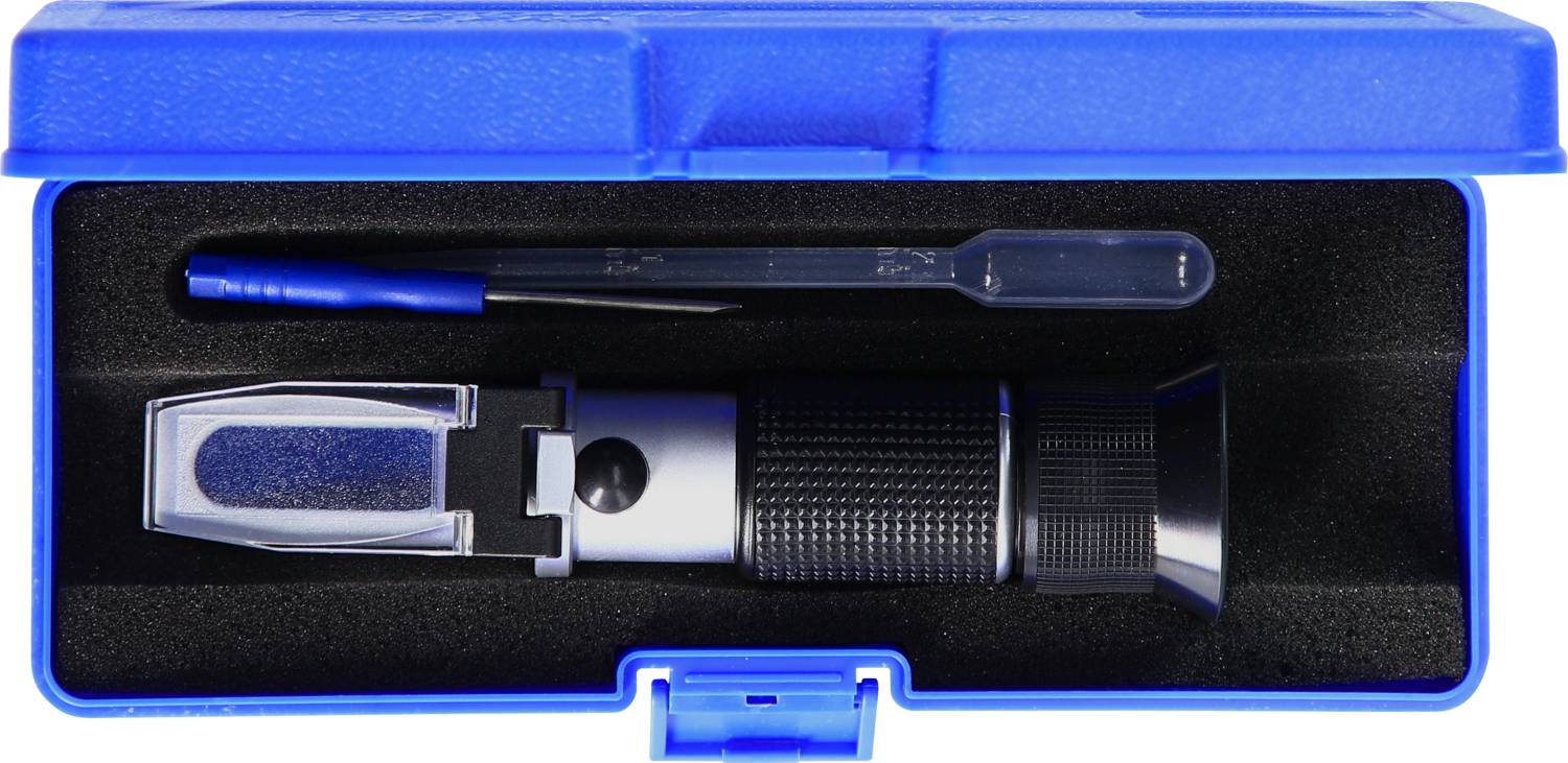 Ein Refraktometer in einer blauen Schachtel mit einer Pipette und einem Schraubendreher, verwendet zur Messung von Flüssigkeitsdichte.