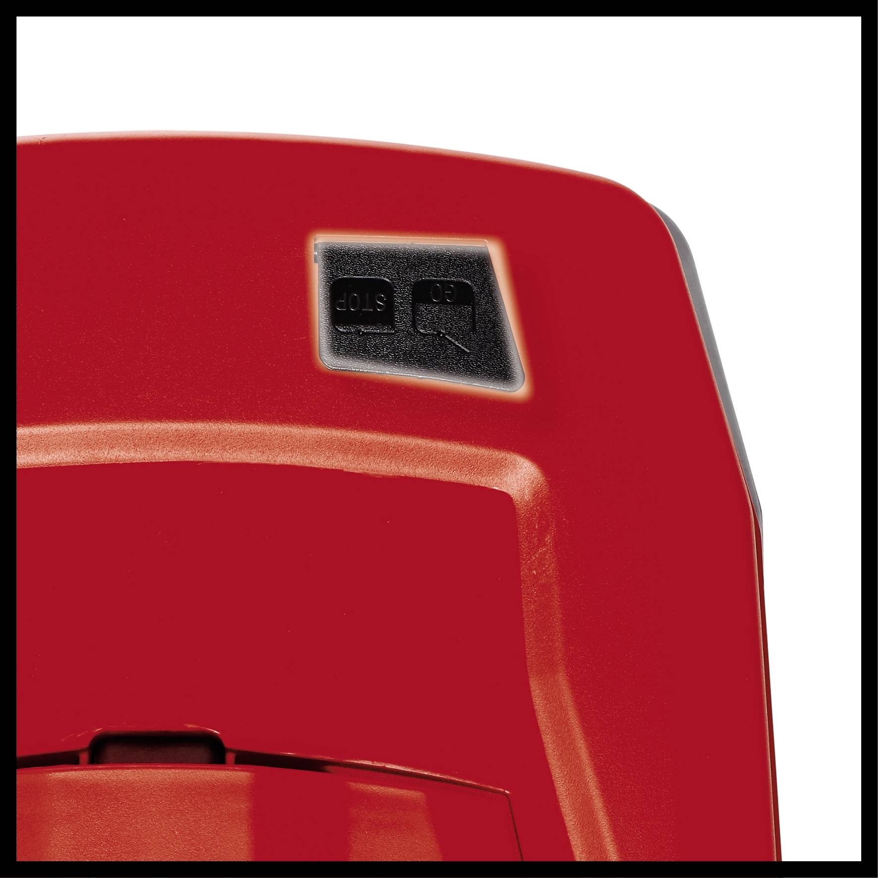 Roter Gehäuseteil eines Geräts mit schwarzem Schalter.