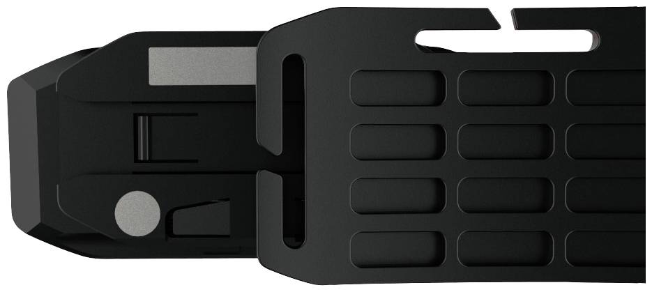 Ein schwarzes, rechteckiges, gerastertes Plastikteil, wahrscheinlich ein technisches oder mechanisches Bauteil.