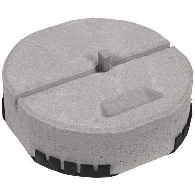 Runde, graue Betonplatte mit Einkerbungen und einem mittigen Anker, möglicherweise ein Fundamentblock für Zeltgestänge oder Sonnenschirme.
