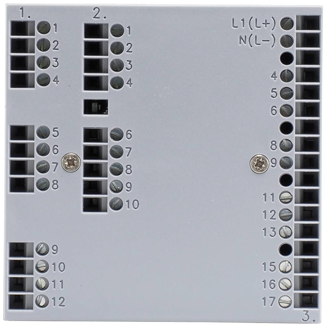 Graues elektrisches Anschlussfeld mit nummerierten Klemmen von 1 bis 17 und zwei Schrauben. Oben rechts sind 'L1(L+)' und 'N(L-)' markiert. 