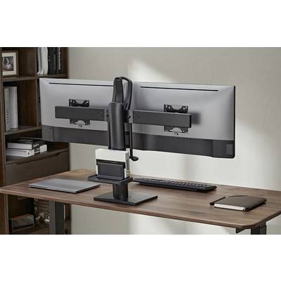 Doppelte Computermonitore sind nebeneinander auf einem Schreibtisch montiert, mit einer Tastatur und einem Notizbuch darunter.