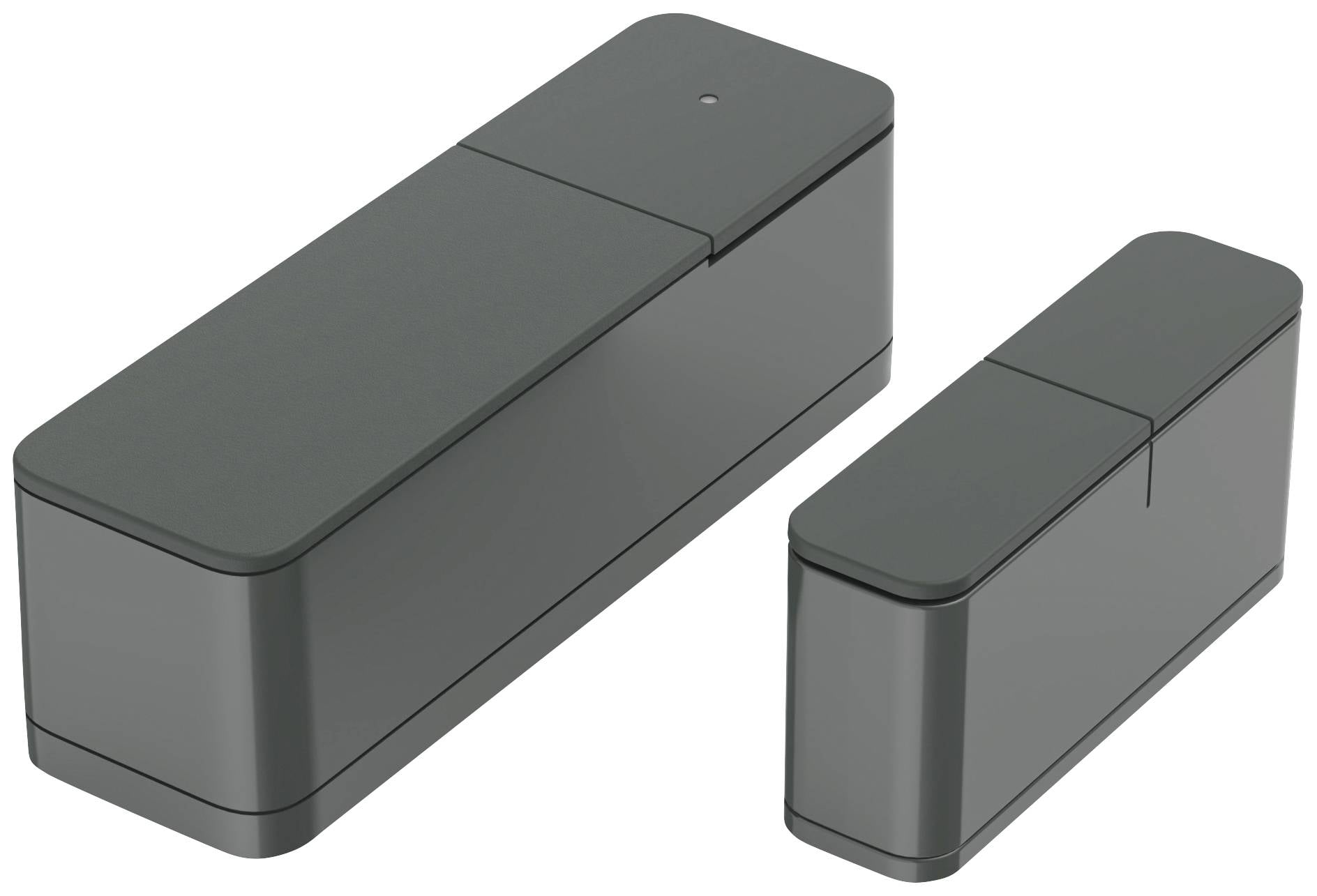 Zwei dunkle, rechteckige Geräte, die nebeneinander stehen. Das linke Gerät ist größer und hat eine kleine LED-Anzeige oben.