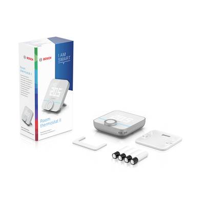 Bosch Raumthermostat II mit Verpackung, Thermostat, Batterien und Befestigungsmaterial. Hauptmerkmal ist die digitale Anzeige.