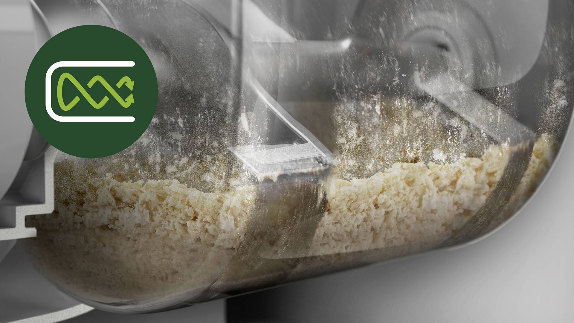 Ein Metallbehälter mit Getreidemasse zeigt den Mahlprozess. Links oben ein grünes Icon mit Wellenlinie und Pfeil, symbolisiert Überwachung.