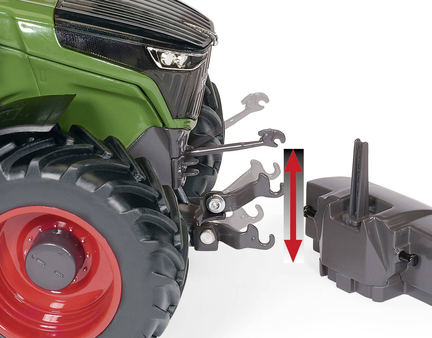 Ein grüner Traktor mit großen Reifen zeigt einen abnehmbaren Frontlader. Ein roter Doppelpfeil weist auf die Hebe- und Senkfunktion hin.