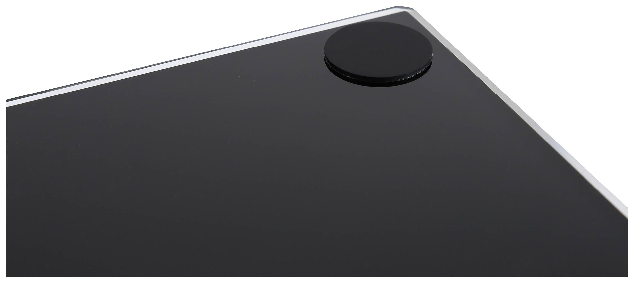 Ecke eines elektronischen Geräts mit Bildschirm und rundem Gummifuß oben rechts, vermutlich Teil eines Laptops oder Tablets.