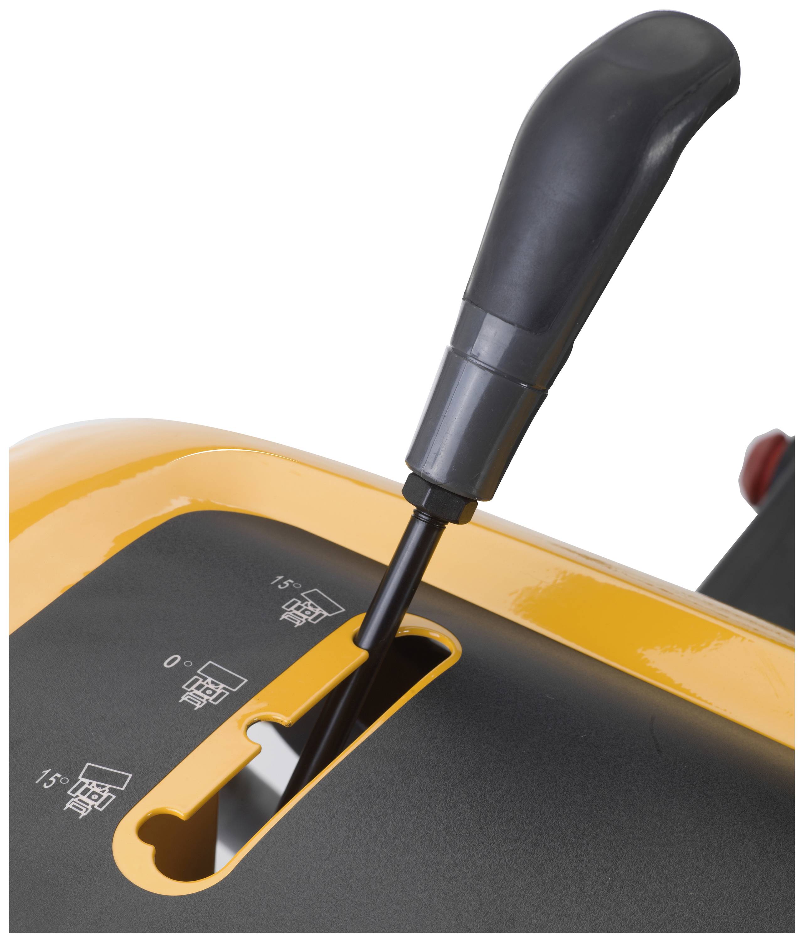 Ein Nahaufnahme eines Schalthebels in einem Gerät mit einer gelben Abdeckung zeigt Markierungen für verschiedene Einstellungen.