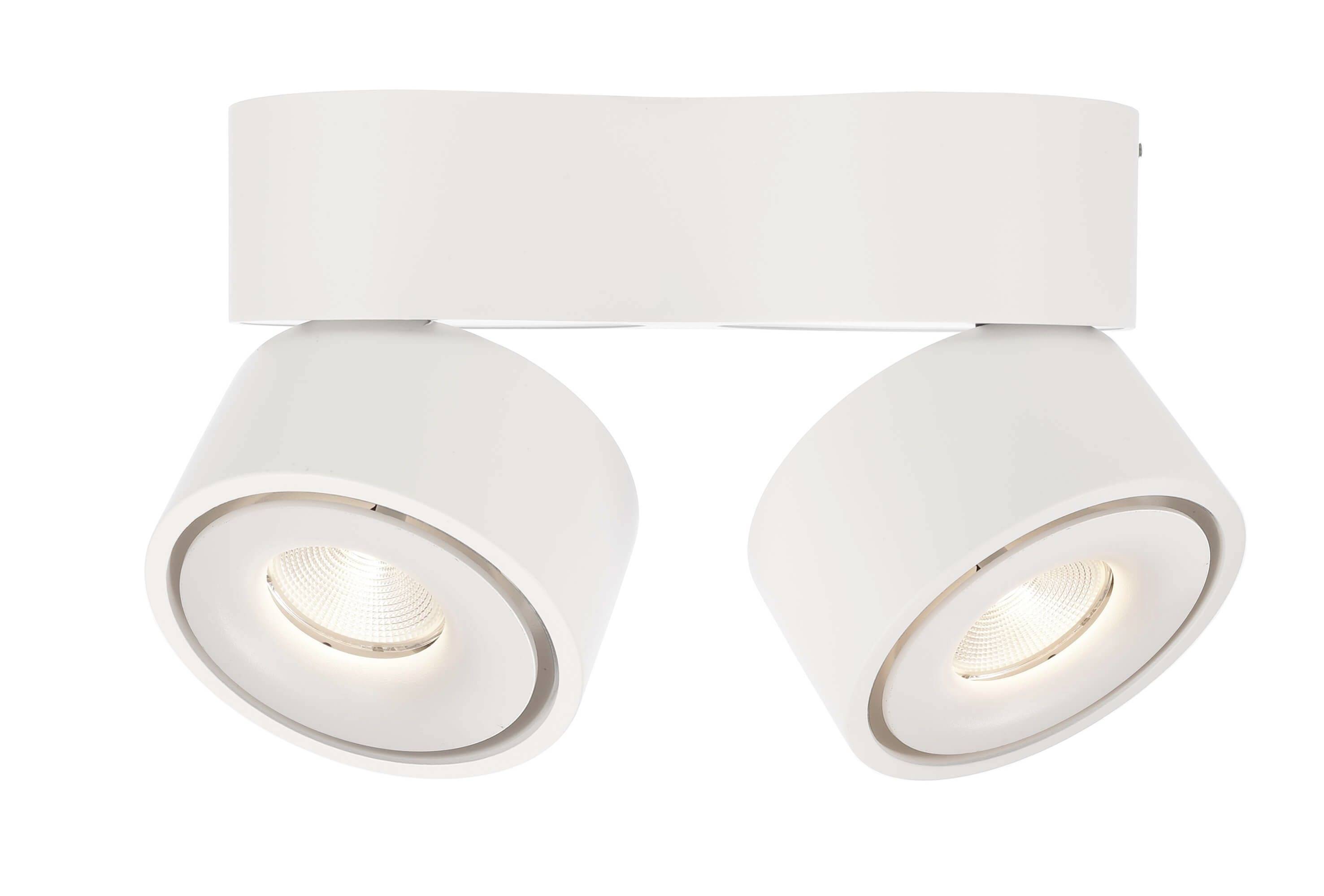Zwei weiße Deckenstrahler mit zylindrischen Lampen, die in unterschiedliche Richtungen zeigen. Ideal für moderne Innenbeleuchtung.