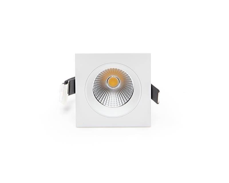 Quadratischer LED-Spot, weißes Gehäuse, zentraler runder Beleuchtungskörper.