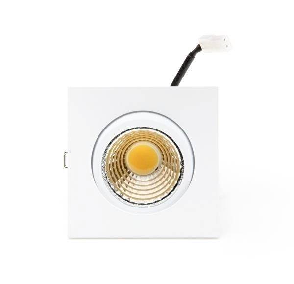 Ein quadratischer Einbauspot mit einer runden, goldenen LED-Lampe in der Mitte und einem schwarzen Anschlusskabel.