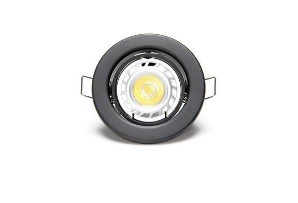 Ein runder, schwarzer LED-Downlight-Einsatz mit sichtbarem gelbem Leuchtelement in der Mitte, geeignet für Deckeninstallationen.