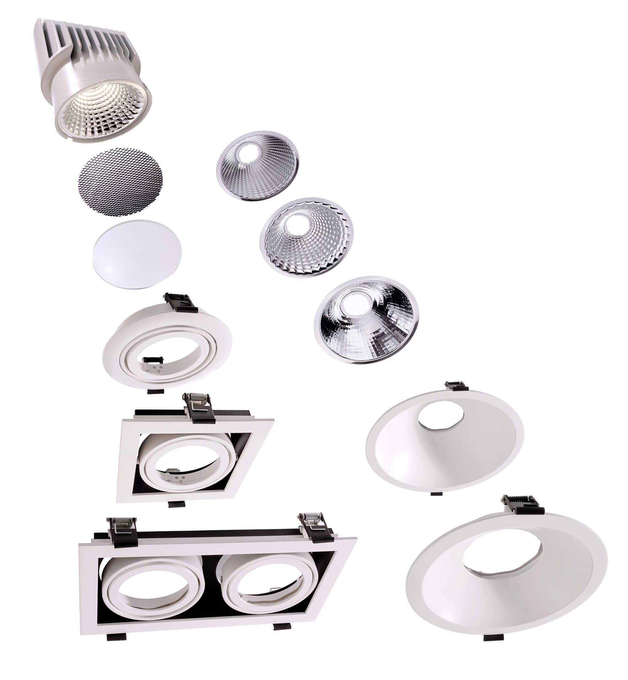 Explosionsdarstellung von Beleuchtungskomponenten: LED-Downlight, Linsen und Reflektoren. Zeigt Aufbau und Teile eines Beleuchtungssystems.