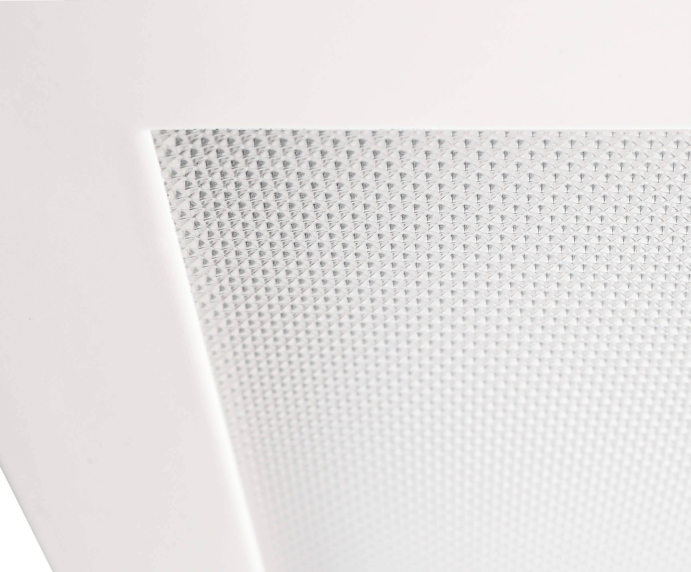 Nahaufnahme einer strukturierten Oberfläche mit einem gitterähnlichen Muster. Höchstwahrscheinlich Teil eines dekorativen oder funktionalen Objekts.