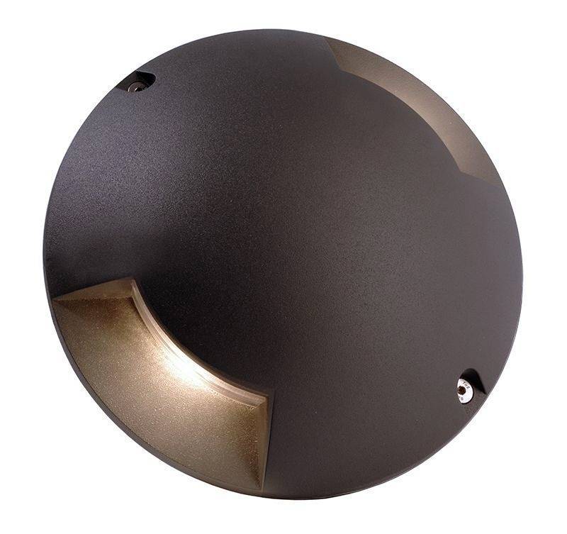 Rundes, dunkelbraunes Licht mit seitlicher Öffnung, das als dezente Beleuchtung in Wänden oder Böden integriert wird.