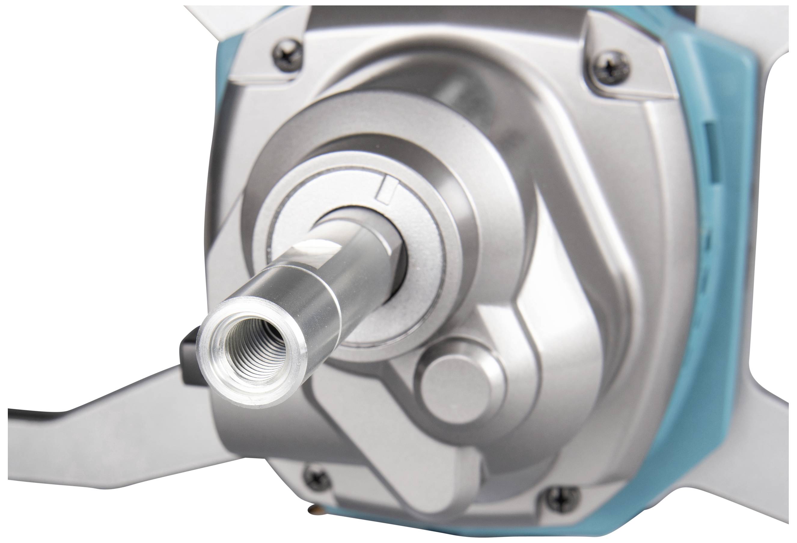 Nahaufnahme einer Metallmaschine mit rotierendem Zylinder und präzisem Mechanismus, möglicherweise Teil eines Werkzeugs oder Geräts.