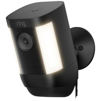 Eine schwarze Überwachungskamera der Marke Ring, montiert an einer Wand, mit integriertem Beleuchtungselement seitlich der Linse.