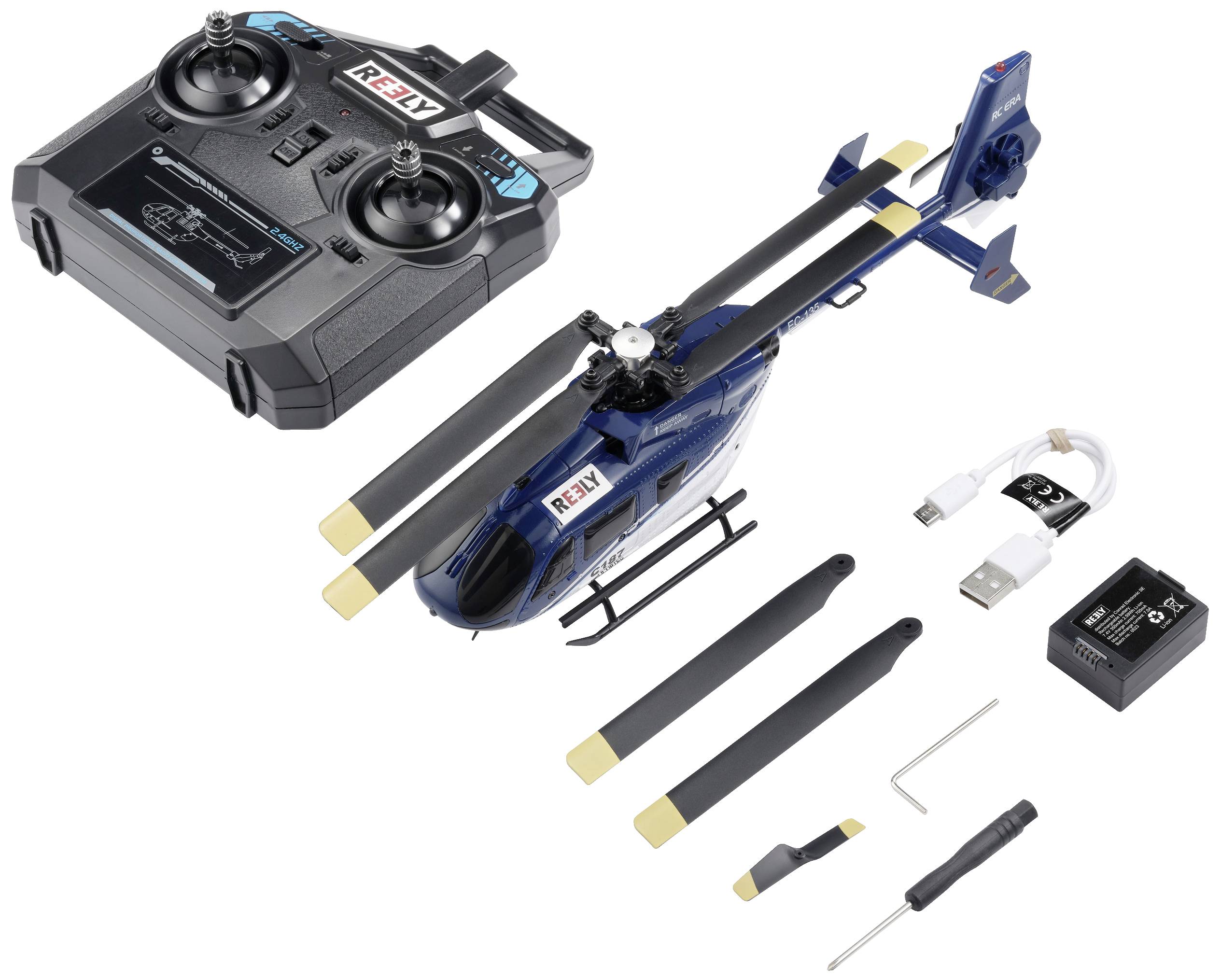 Fernsteuerbarer Hubschrauber-Kit mit Steuerung, Ladegerät, Ersatzrotorblättern und Werkzeug.