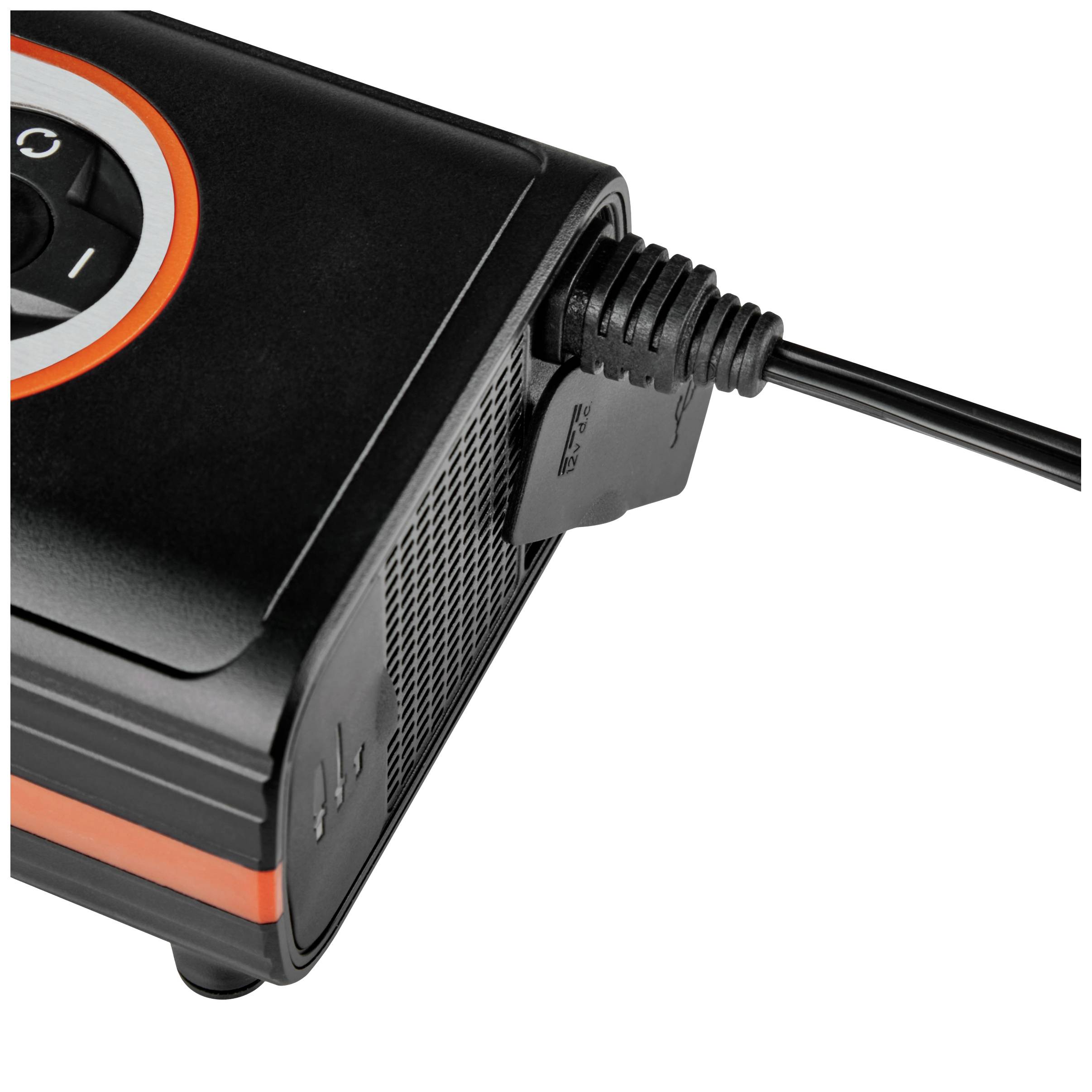 Ein Beamer mit einem angeschlossenen Netzkabel zeigt den Einschaltknopf und Lüftungsgitter, bereit für den Betrieb.