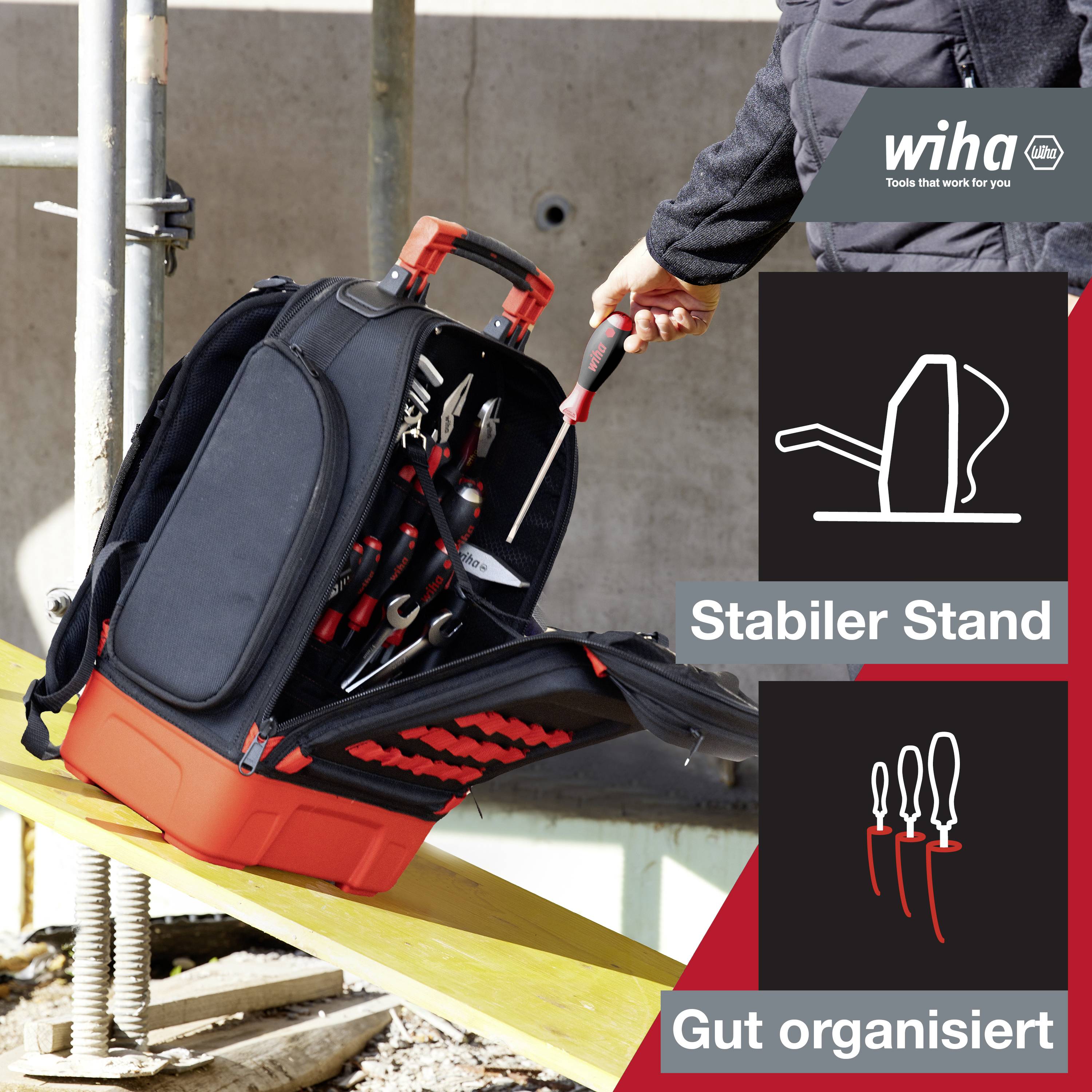 'Werkzeugtasche mit stabiler Basis und geöffneter Vorderseite zeigt gut organisierte Werkzeuge. Wiha-Logo oben rechts.'