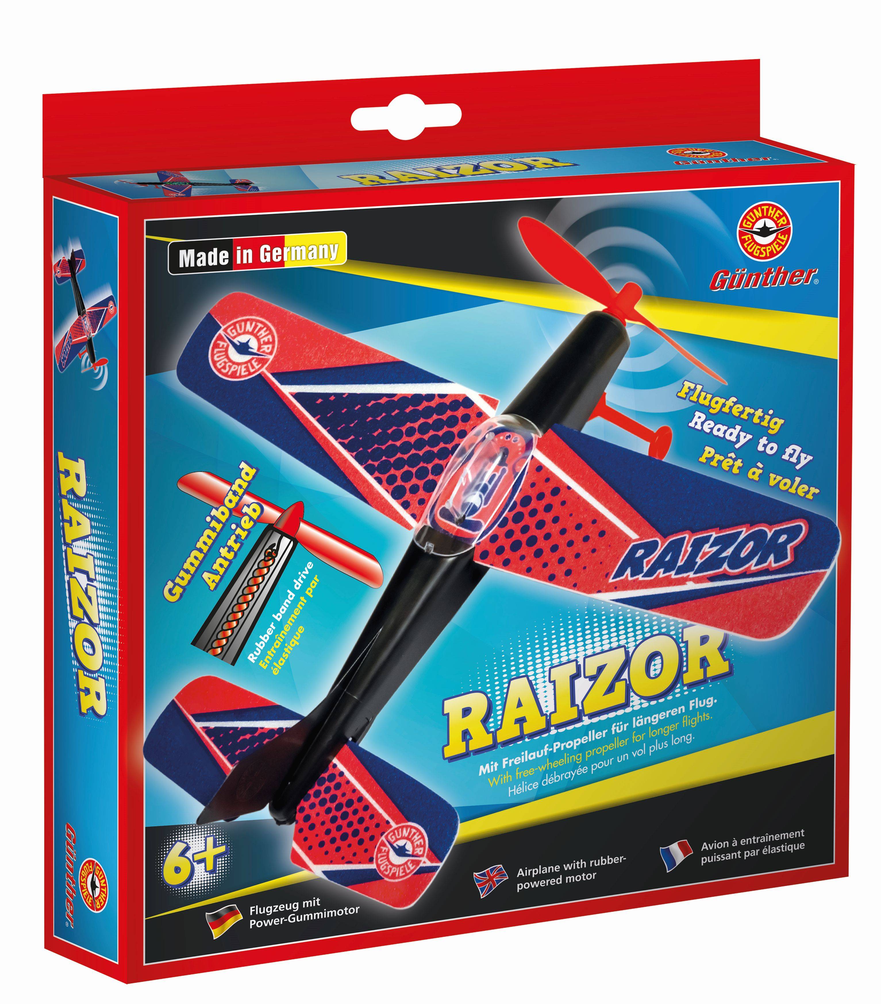 Spielzeugpackung eines Modellflugzeugs 'RAIZOR', geeignet ab 6 Jahren. Enthält ein Flugzeug mit Handstartrampe. Hergestellt in Deutschland.