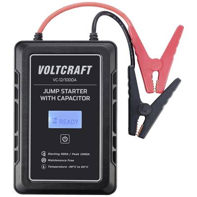 Ein schwarzer Starthilfegerät mit LED-Anzeige. Text auf dem Gerät: 'Voltcraft', 'Jump Starter with Capacitor', 'Ready'.
