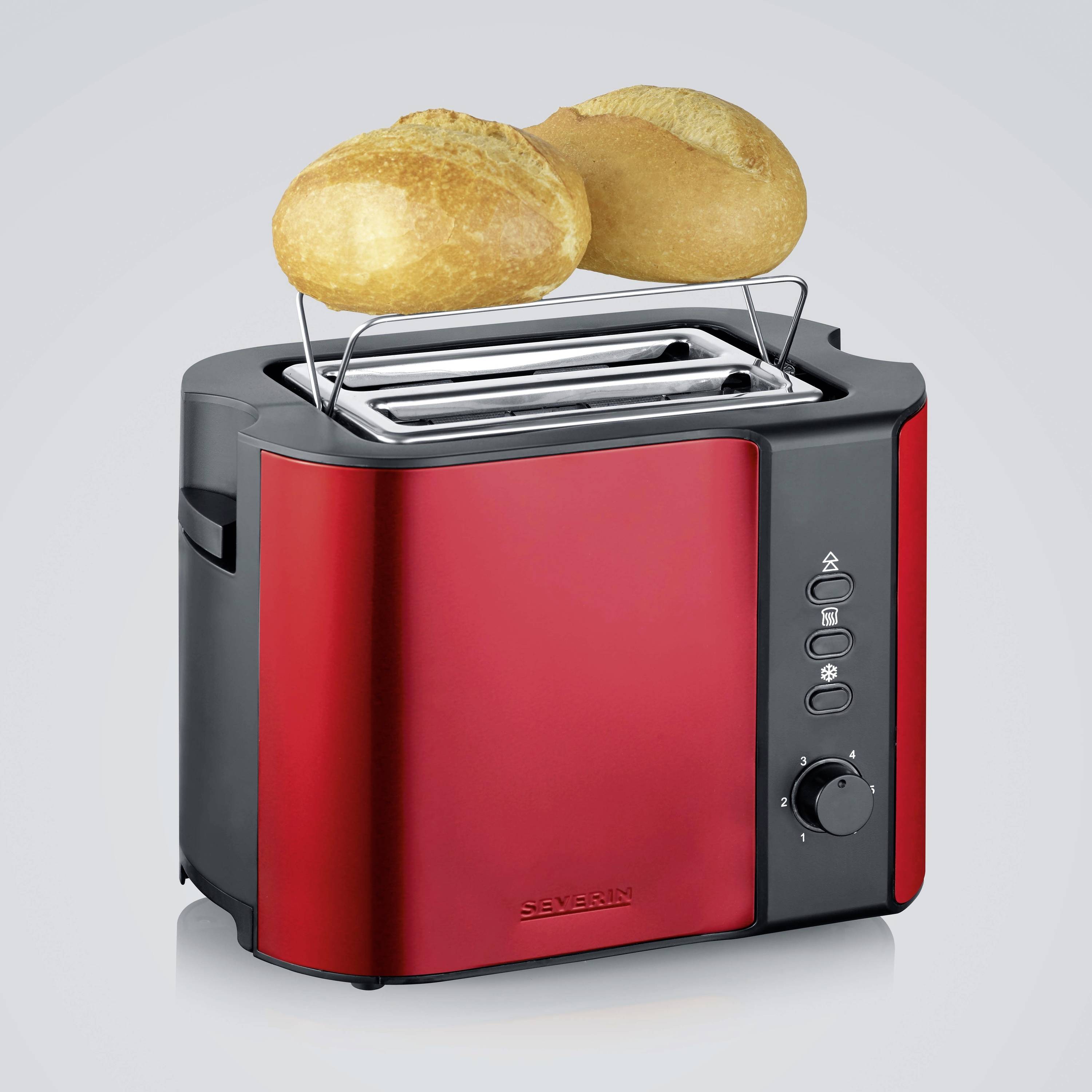 Zwei Brötchen auf einem roten Toaster. Der Toaster hat Bedienelemente an der Seite.