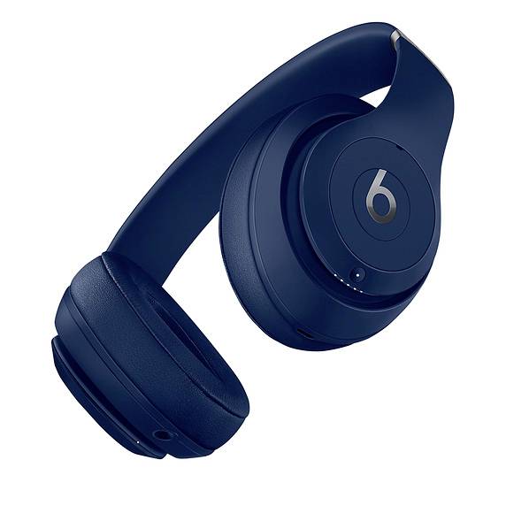 Blaue drahtlose Over-Ear-Kopfhörer mit einem stilisierten 'b' auf der Ohrmuschel.
