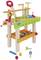 Holzwerkbank für Kinder mit buntem Werkzeug und Schrauben. Enthält Säge, Hammer, Lineal und Schraubenschlüssel. Ideal für kreatives Spielen.