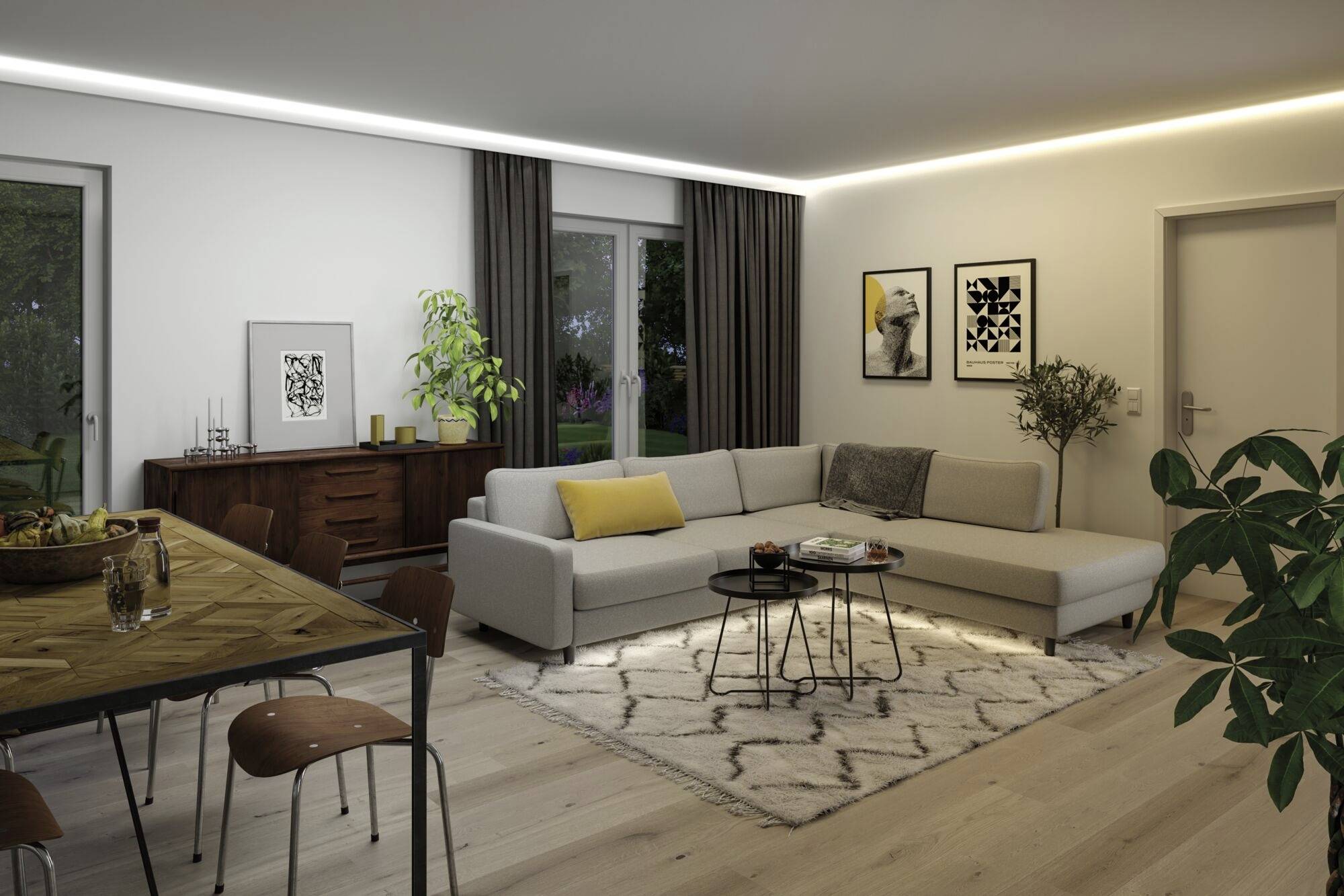 Ein modernes Wohnzimmer mit grauem Sofa, Holztisch und Pflanzen. An den Wänden hängen Kunstwerke. Weiches Licht beleuchtet den Raum.