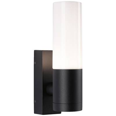 Eine moderne, zylindrische Wandlampe mit schwarzer Halterung und weißem Lampenschirm leuchtet sanft.
