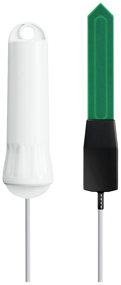 Ein weißer Zylinder und ein schwarzer Stab mit grünem Spitze stehen nebeneinander, jeweils mit einem Kabel verbunden.