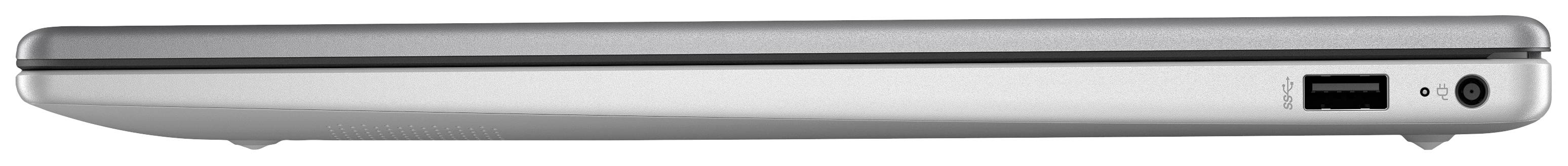 Geschlossenes Laptop von der Seite gesehen, zeigt schlankes Design mit USB-Anschluss und Stromanschluss.