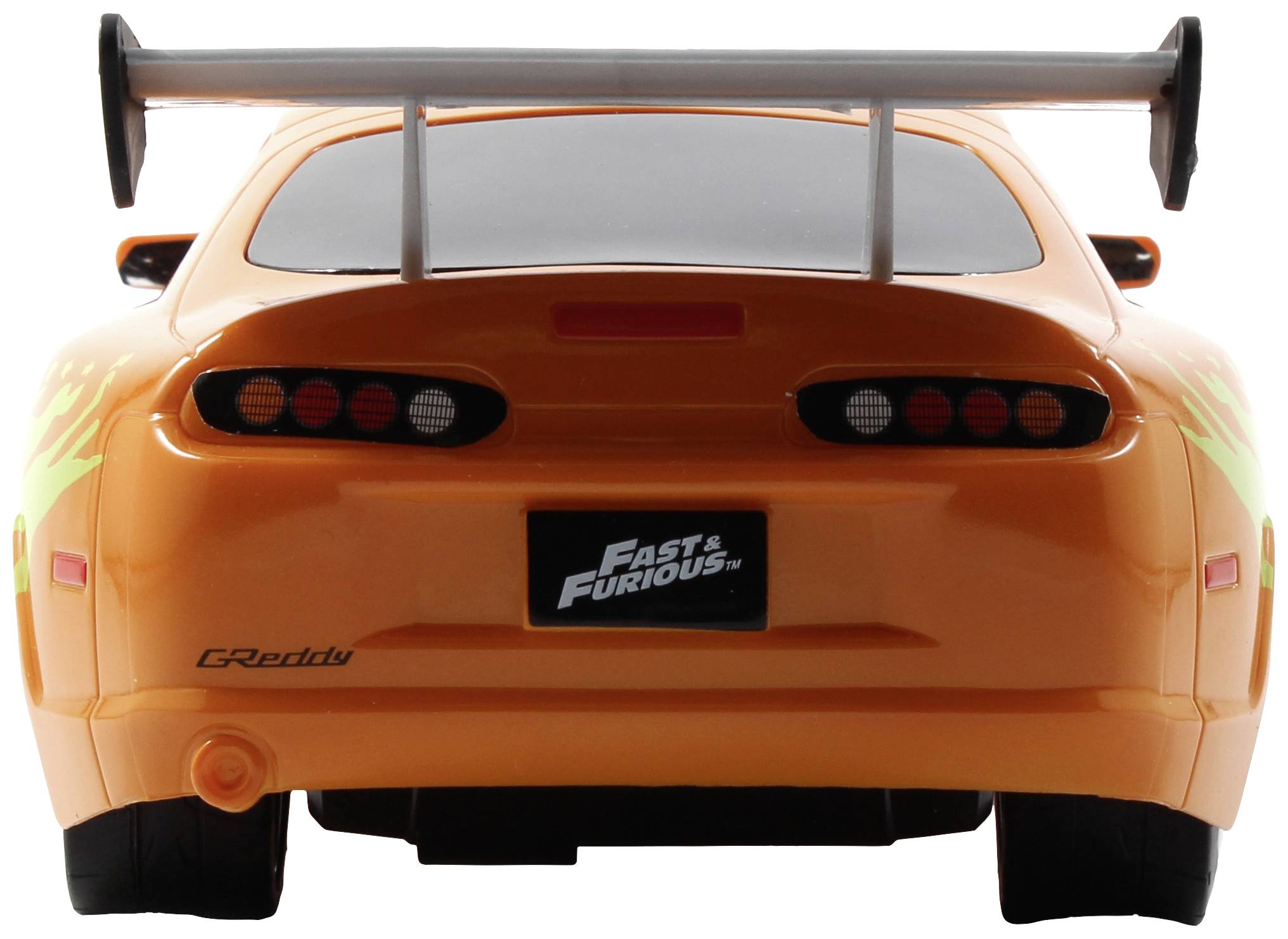 Spielzeugauto im Design eines Sportwagens, orange mit Heckspoiler, inspiriert von der Filmreihe 'Fast & Furious'.