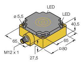 Sensor mit gelbem Gehäuse, Maße: 65x65 mm, Höhe: 40,5 mm. Zwei LED-Anzeigen. Anschluss M12x1 an der Seite.