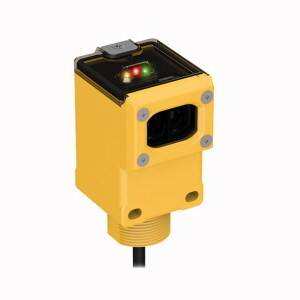 Eine kompakte gelbe Industriekamera mit schwarzem Objektiv und Statusanzeige auf der Oberseite, ideal für Automatisierungssysteme.