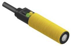 Ein länglicher, gelber Sensor mit zwei Anzeigenleuchten und einem Anschlusskabel; dient zur Erfassung von Objekten.