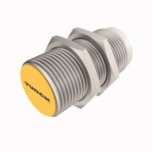 Sensor im zylindrischen Metallgehäuse mit gelber Vorderseite, gekennzeichnet mit 'TURCK', misst physikalische Parameter.