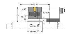 Technische Zeichnung eines Sensors mit Maßen und Abständen in Millimetern. Der Sensor ist auf einer Basis montiert.