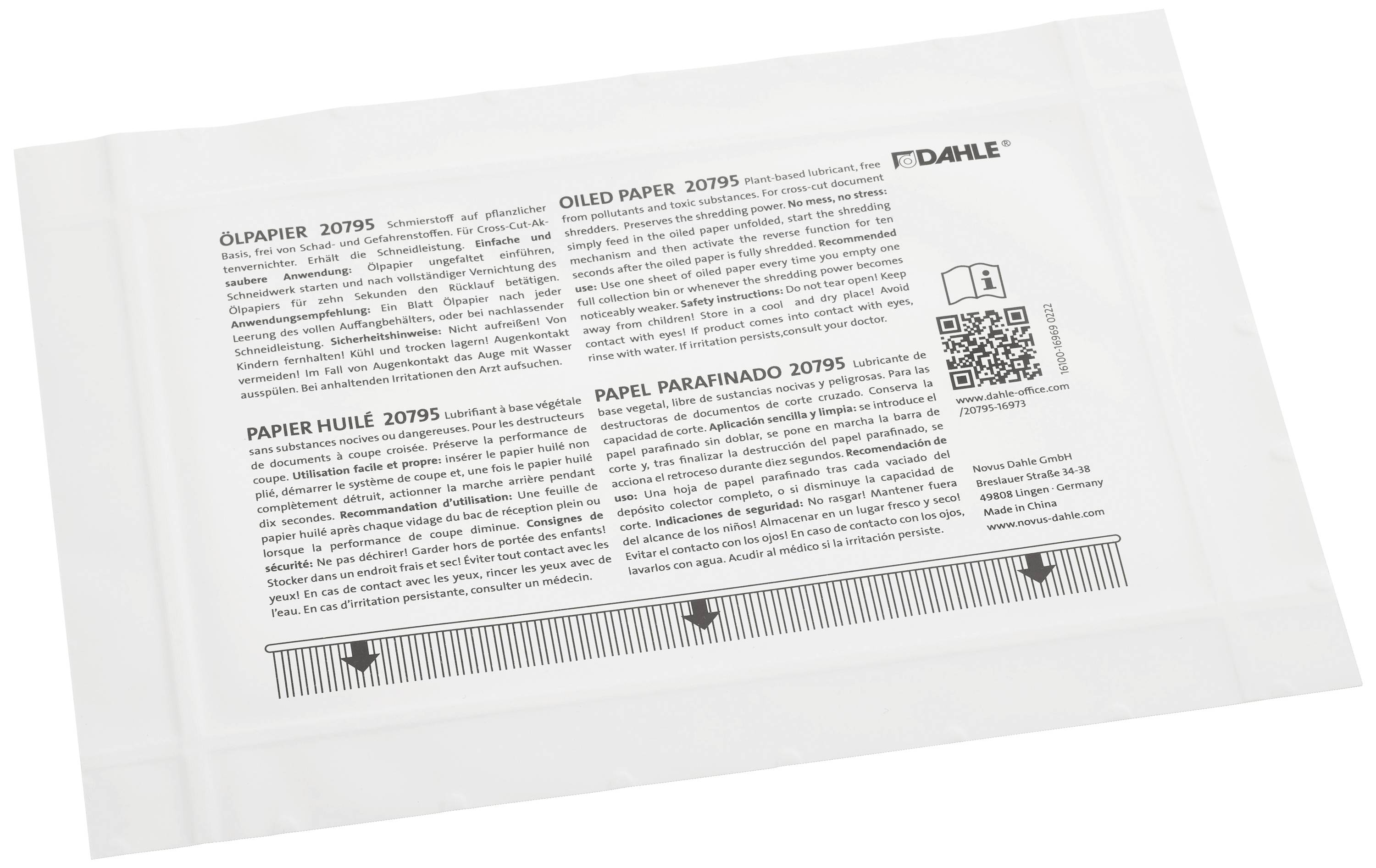 Weißes Blatt Ölpapier der Marke Dahle, mit Text in mehreren Sprachen und einem QR-Code. Verwendung zur Wartung von Schneidemaschinen.